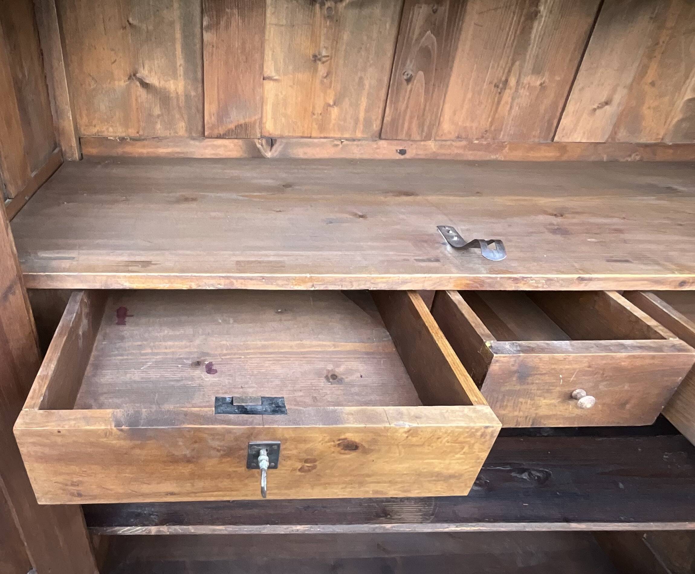 Empire wardrobe in solid walnut, France, mid-19th century.
