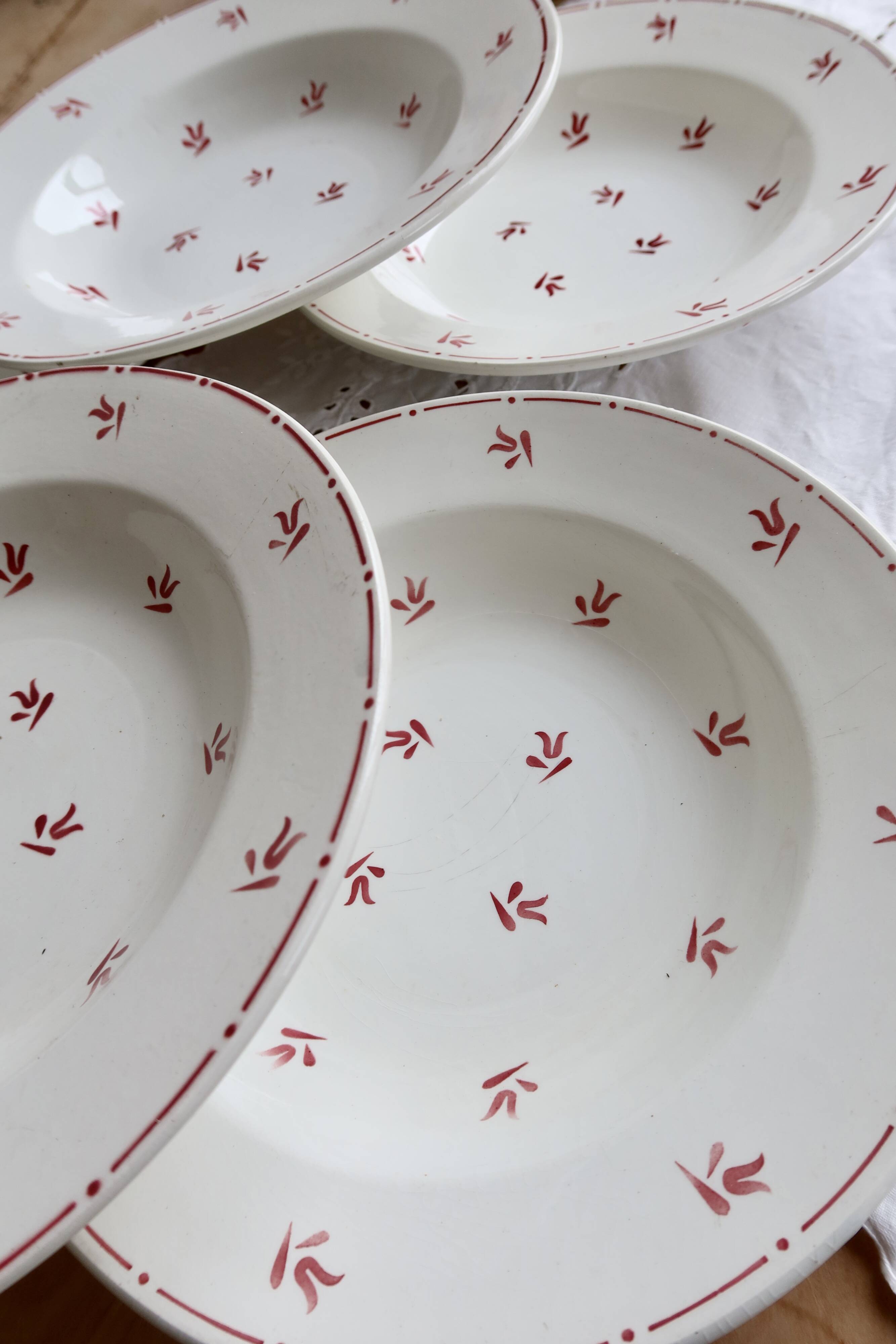 6 vintage white earthenware deep plates with red patterns
