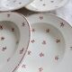 6 vintage white earthenware deep plates with red patterns