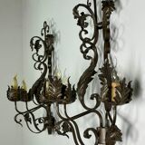 Wrought iron wall lights (pair) with foliage decoration