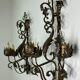 Wrought iron wall lights (pair) with foliage decoration