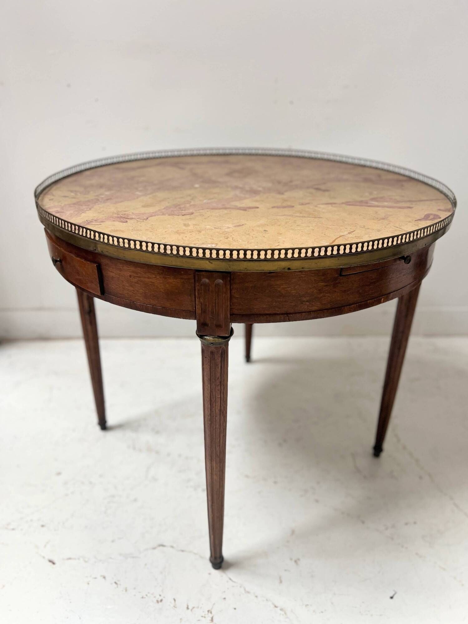 Louis XVI style bouillotte table in veneered wood, 20th century.