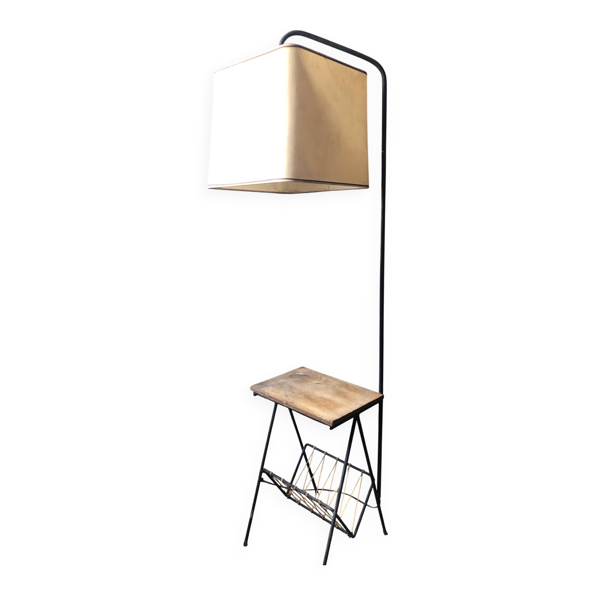 Modernist floor lamp with shelf and magazine holder.