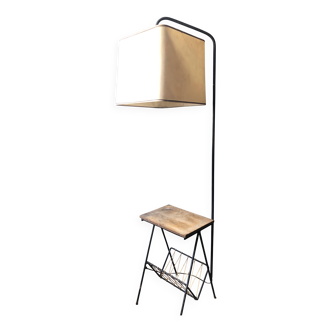 Modernist floor lamp with shelf and magazine holder.