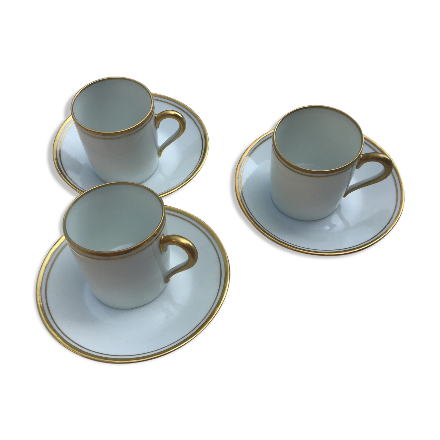 3 cups and their limoges porcelain undercup