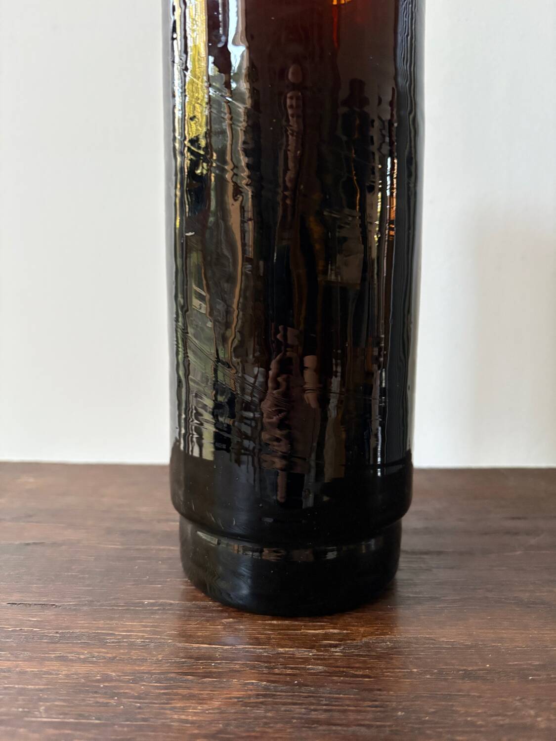 Vintage 1970s garnet brown glass roller vase