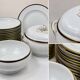45-piece table service in Limoges porcelain by Chastagner, blue and gold.