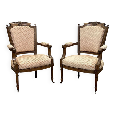 Paire de fauteuils Louis XVI début XXème en noyer