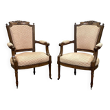 Pair of early 20th century Louis XVI armchairs in walnut
