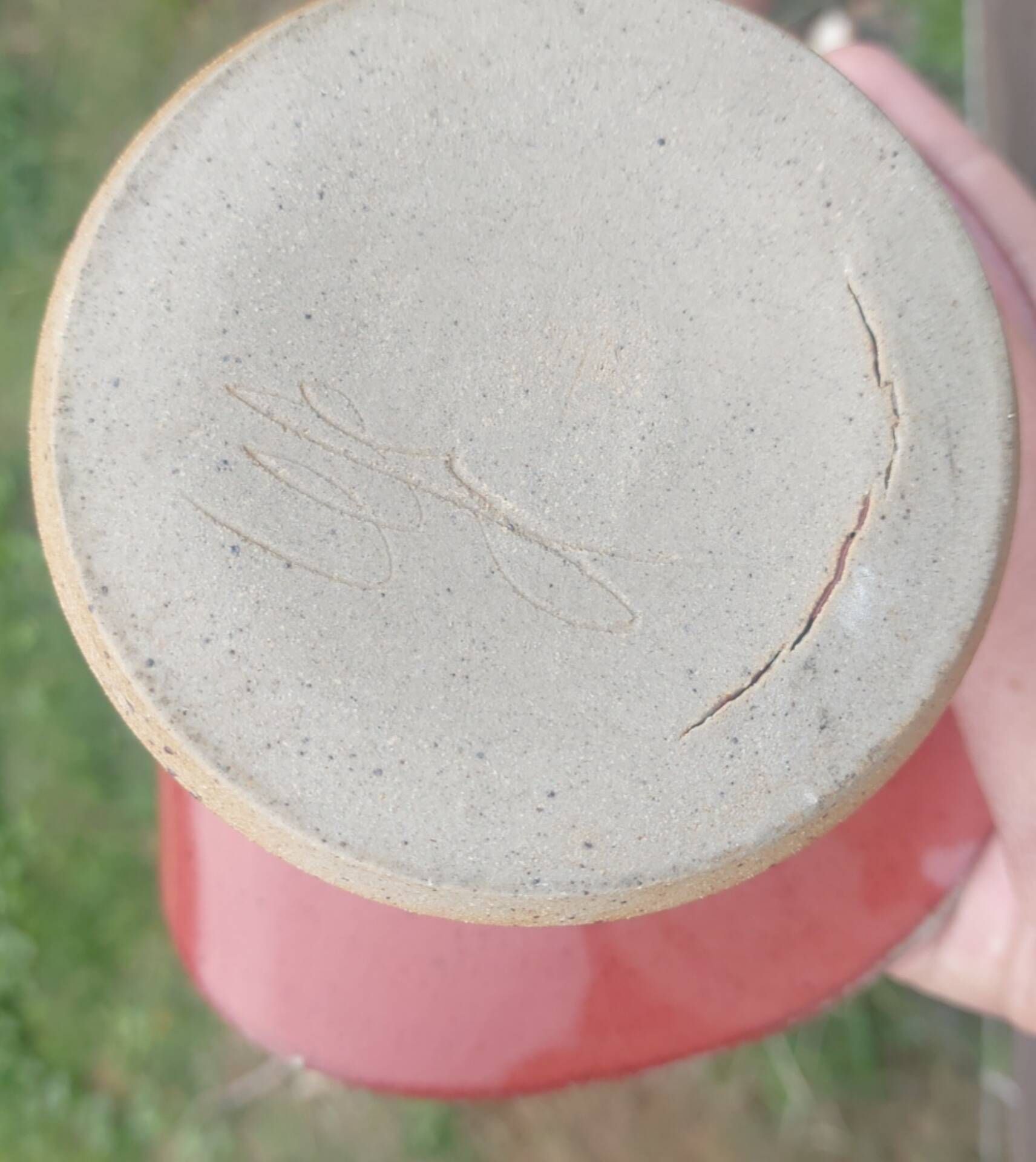 Pair of speckled red and black glazed stoneware ceramics – Signature