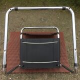 Design armchair with chrome metal tubular base and seat in black Skaï