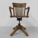 Oak office chair with spring mechanism and armrests