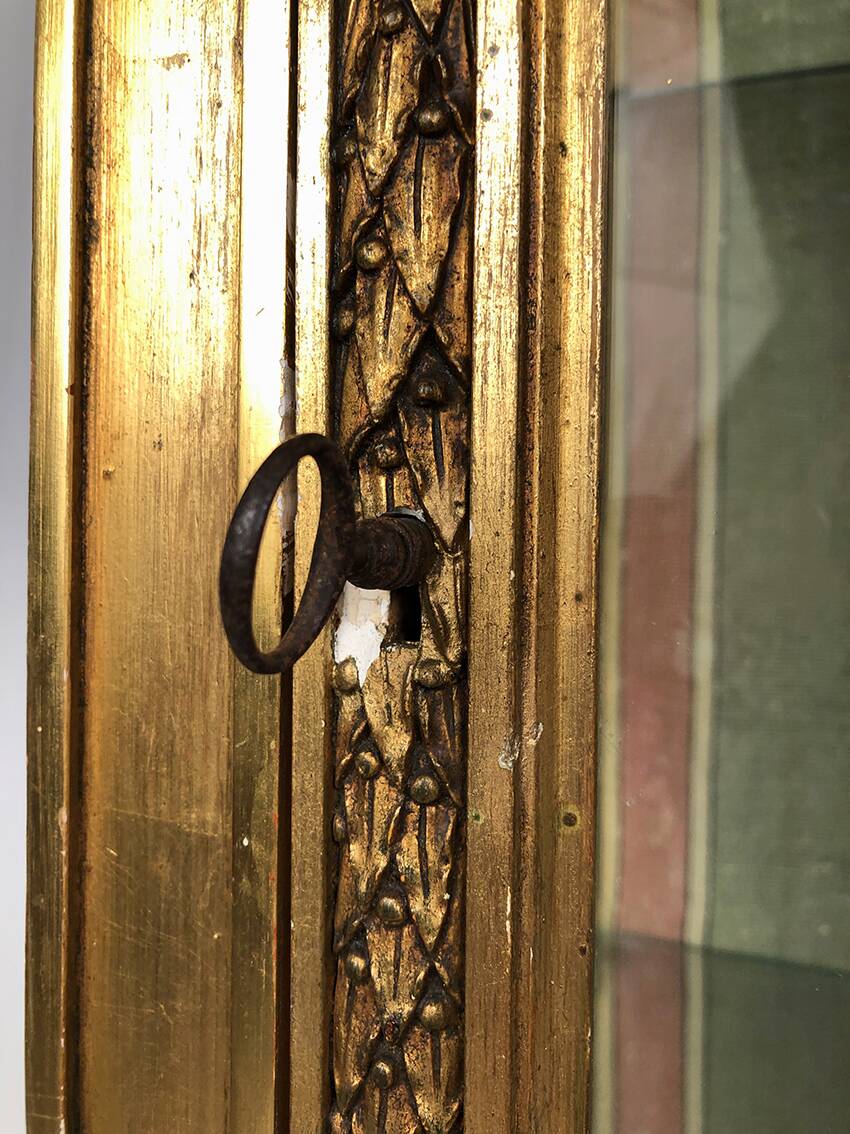 Louis XVI style showcase in wood and gilded stucco, circa 1900