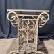 Nesting tables in patinated iron.