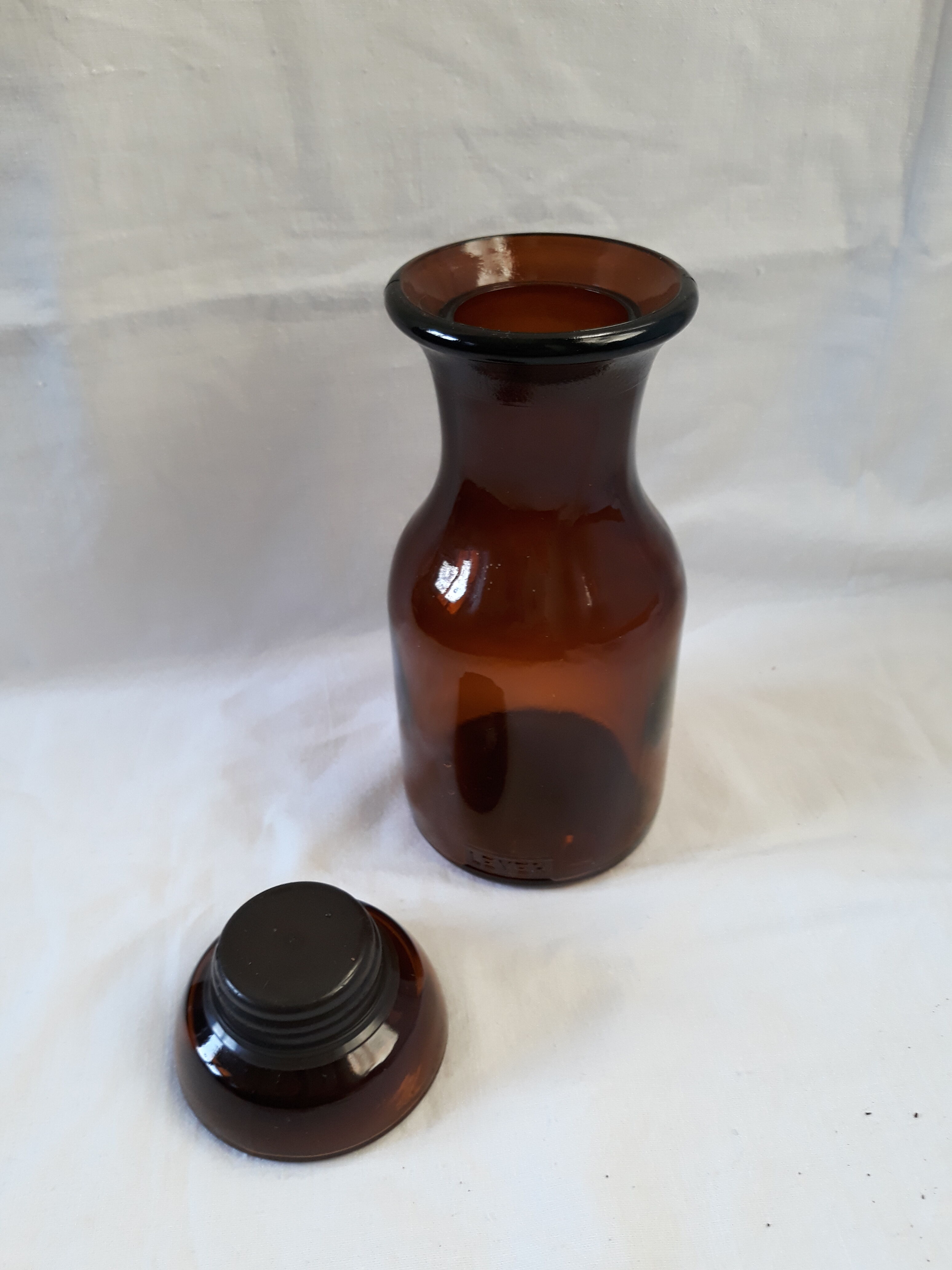 Apothecary bottle jar in amber brown glass with cap