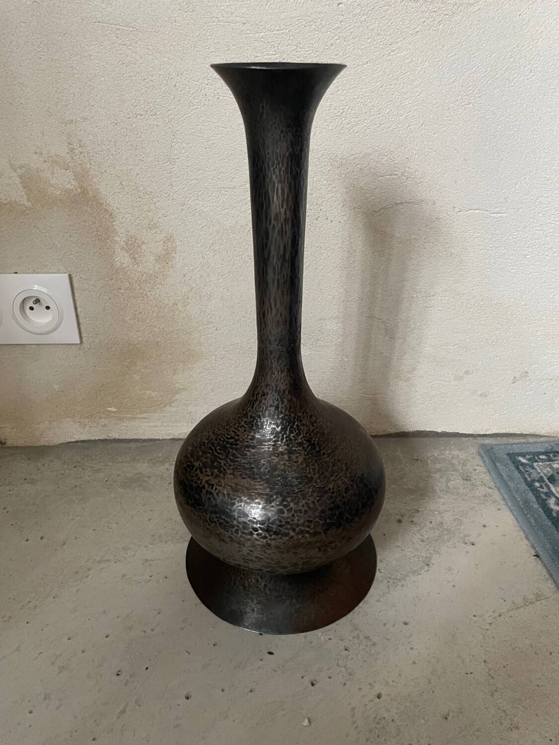 Hammered metal vase