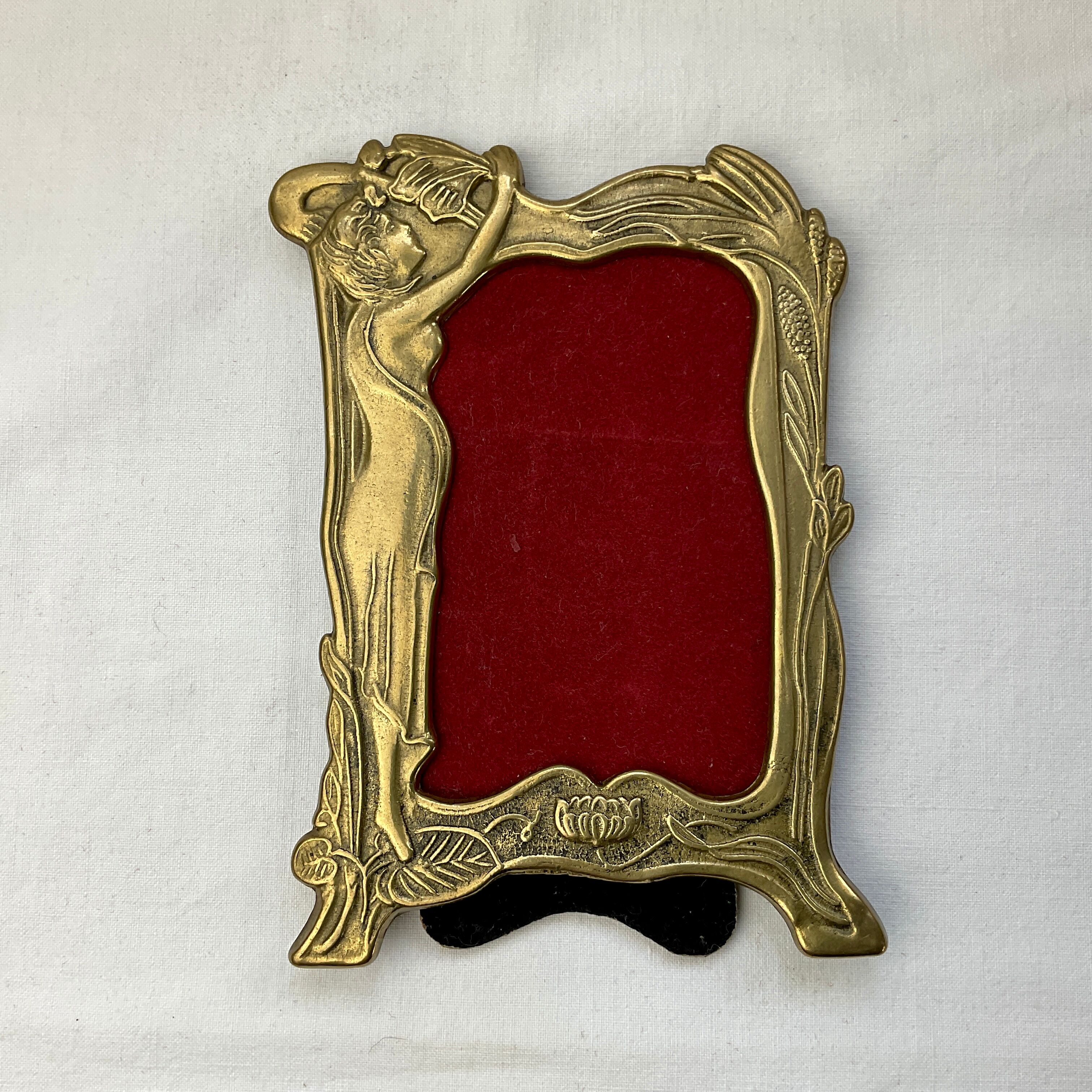 Pair of brass frames with Art Nouveau style woman