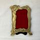 Pair of brass frames with Art Nouveau style woman