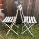 Pair of vintage white metal & wood folding garden chairs