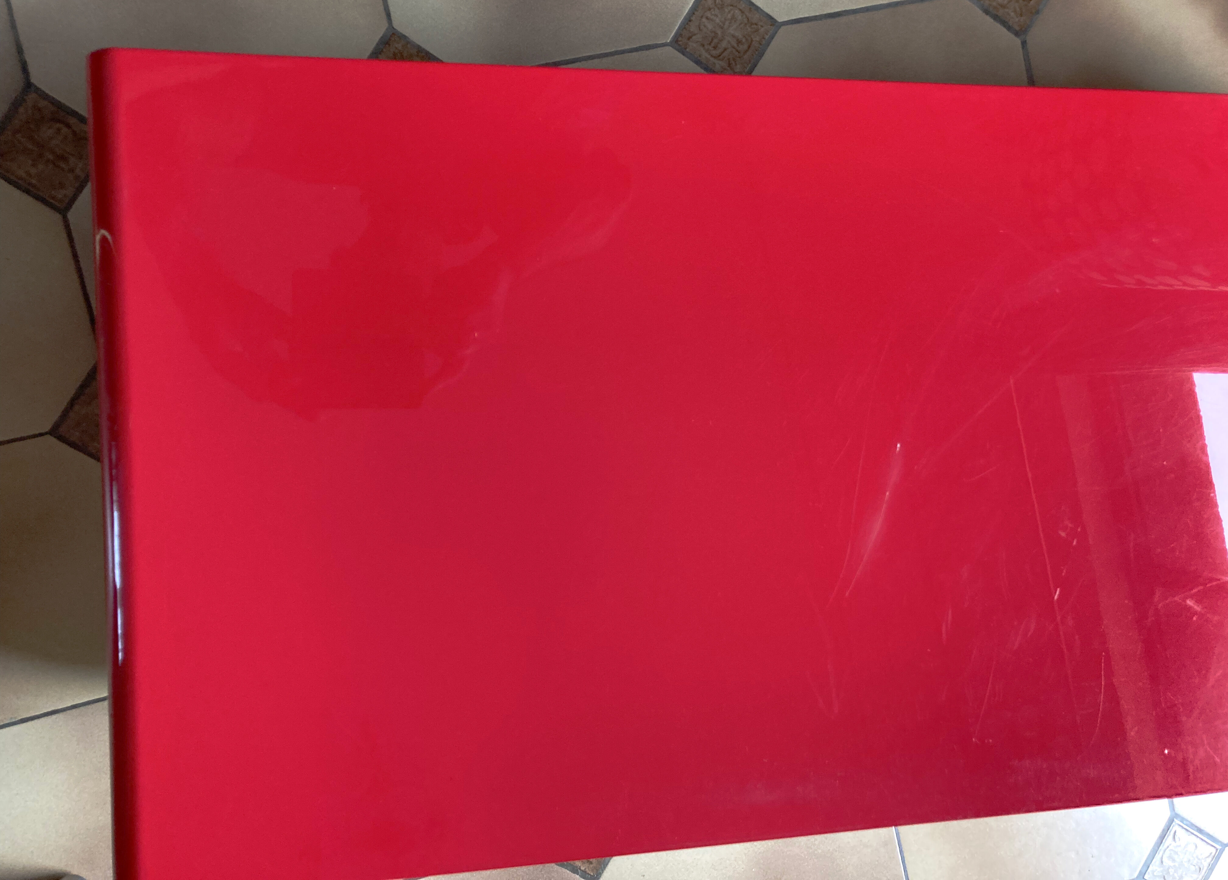 Lacquered red tv cabinet