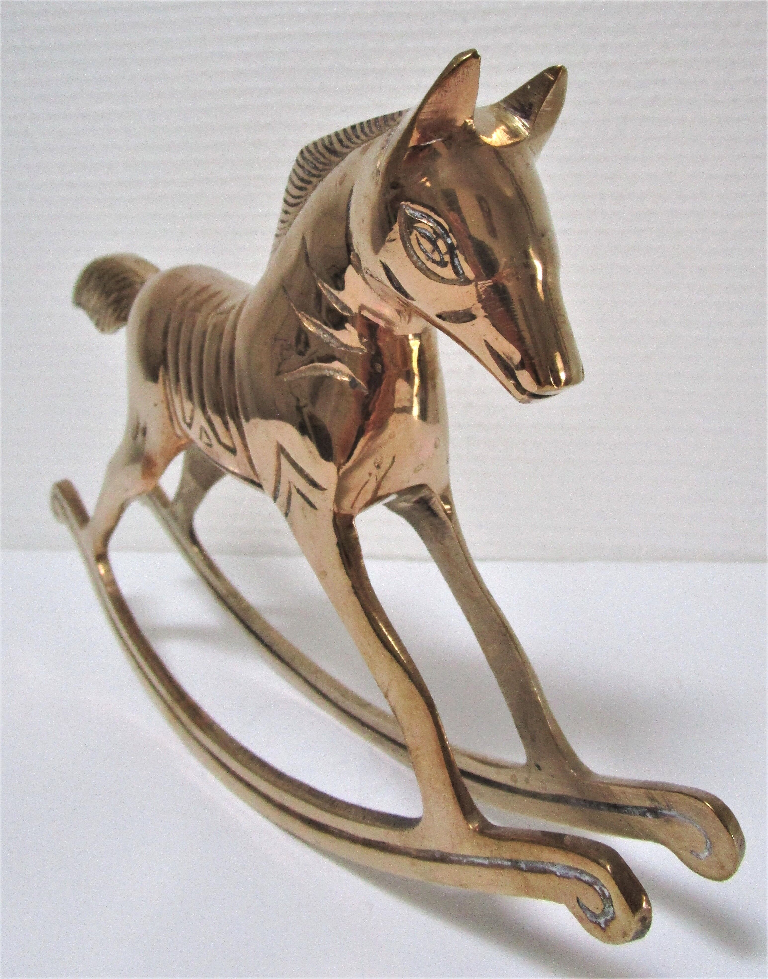 Vintage brass rocking horse 70