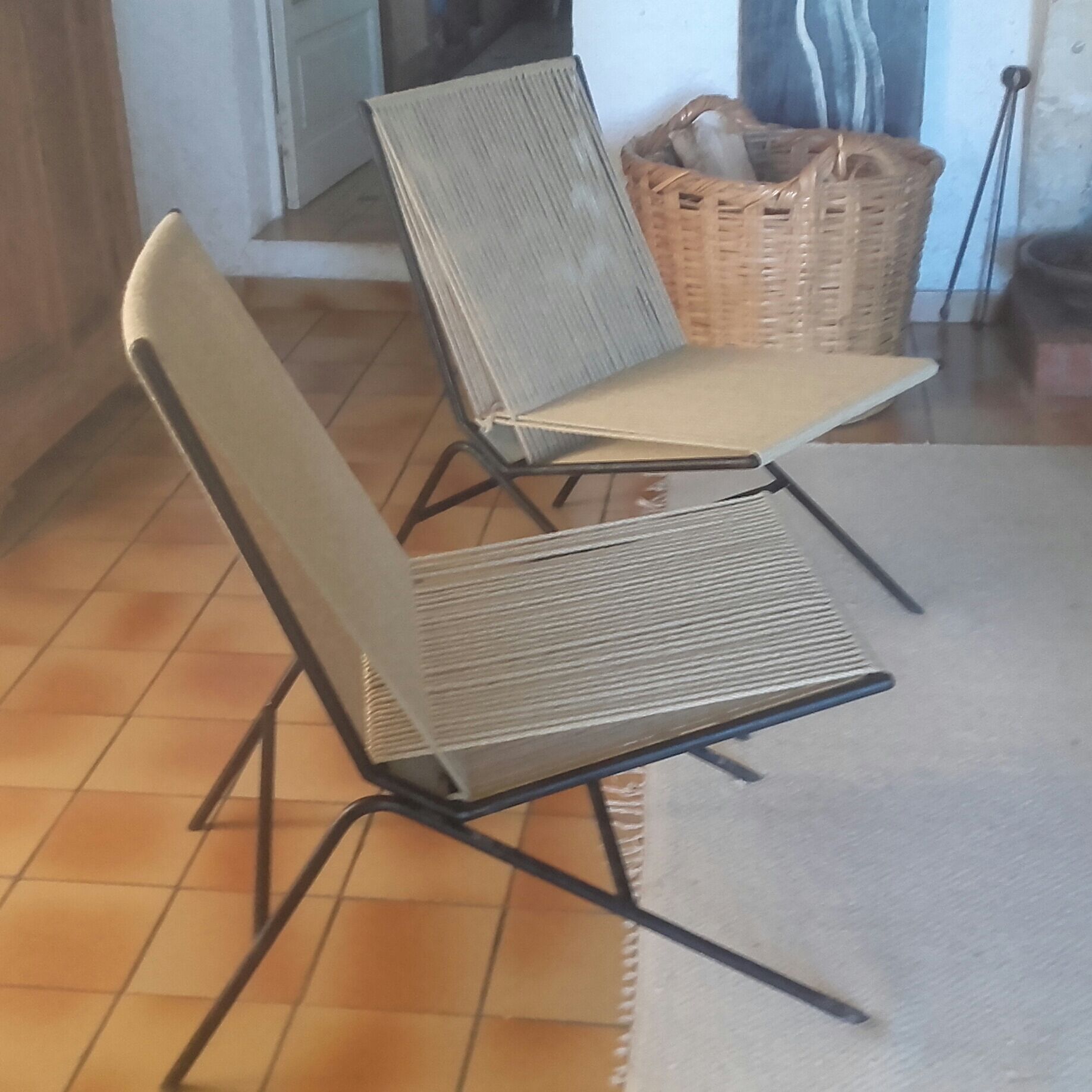 Seated metal and rope backs armchairs