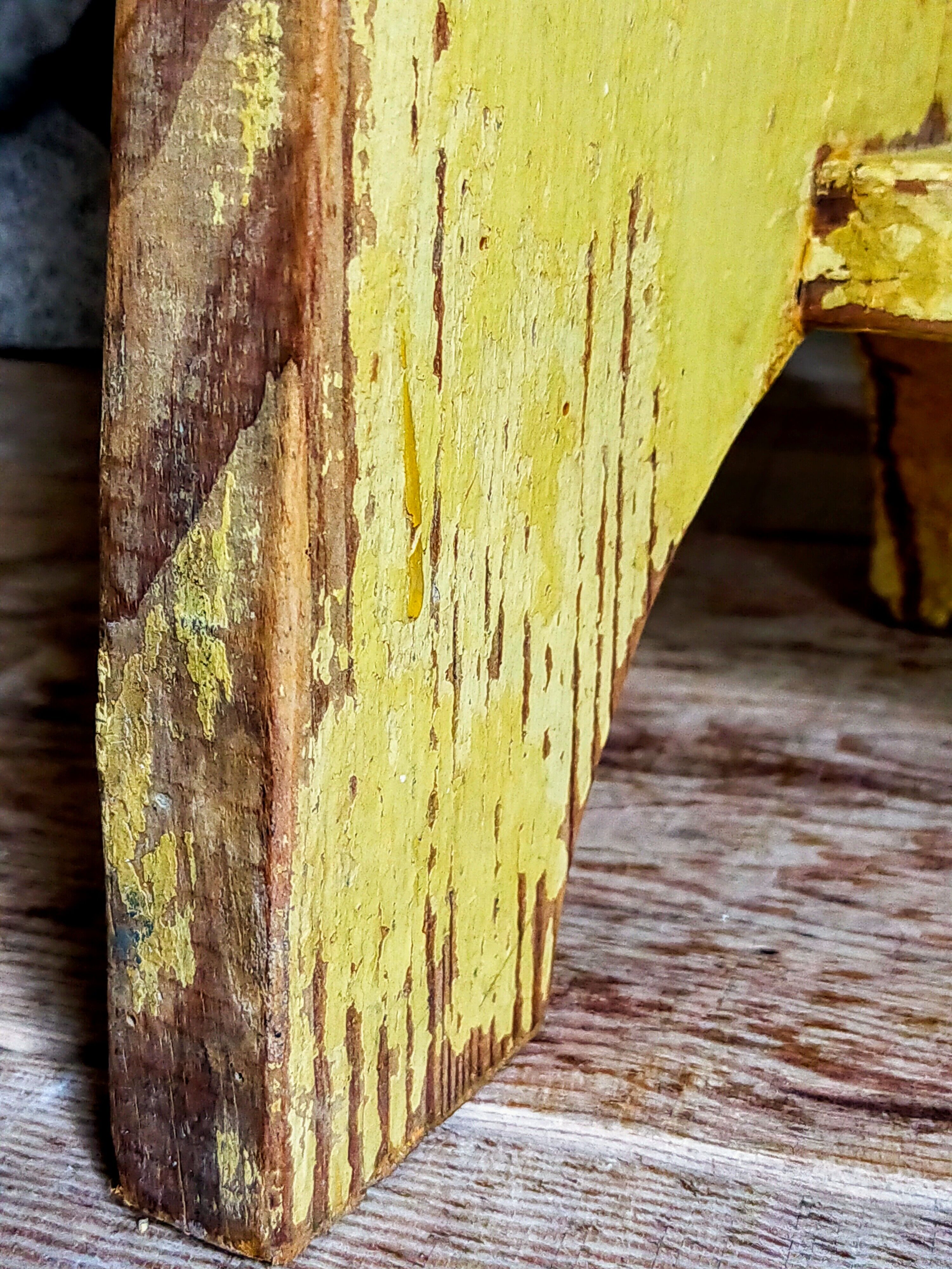 Art-populaire workshop stool in patinated wood