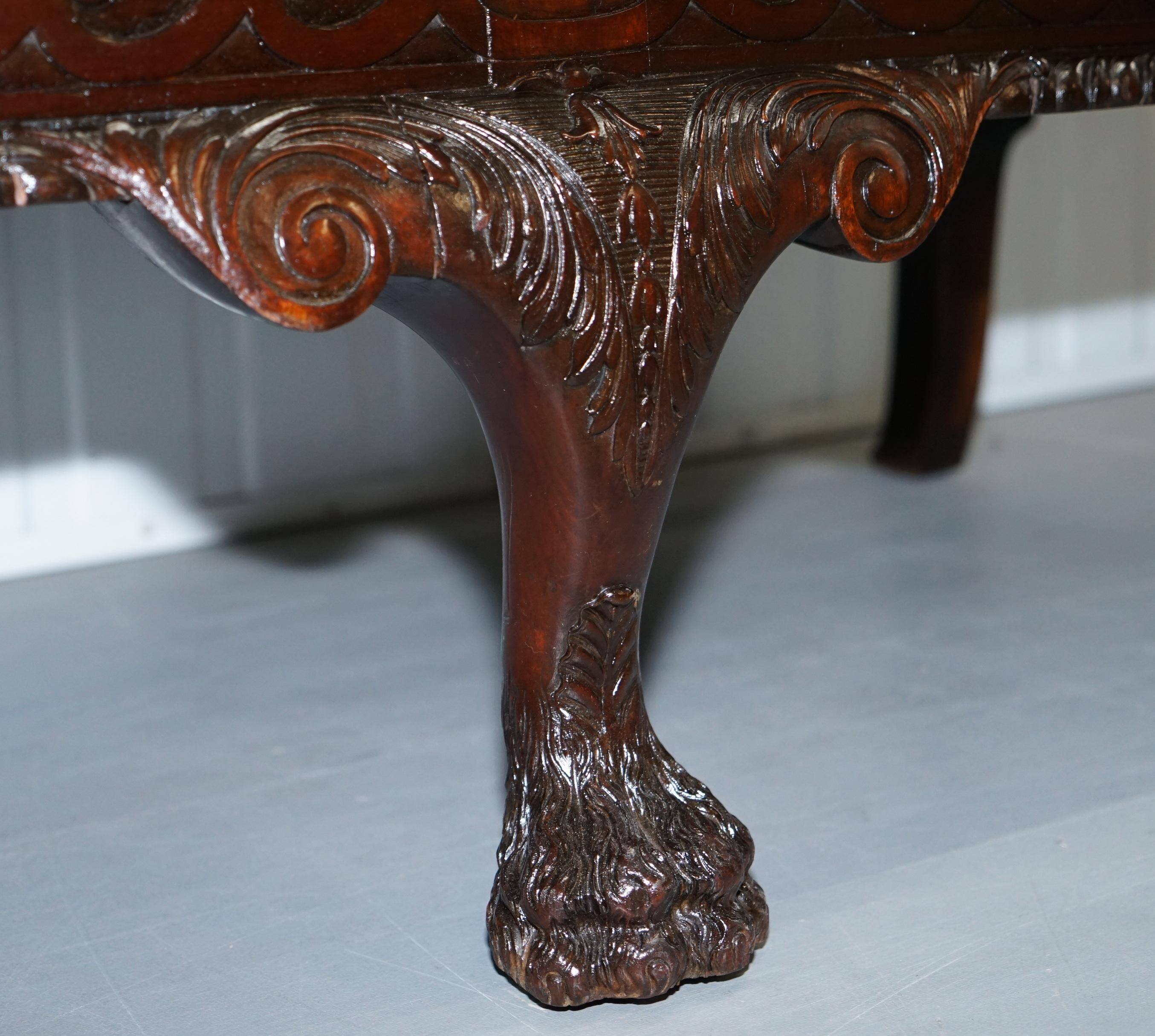 Chesterfield leather canapé in Georgian style with lion paw carved feet.
