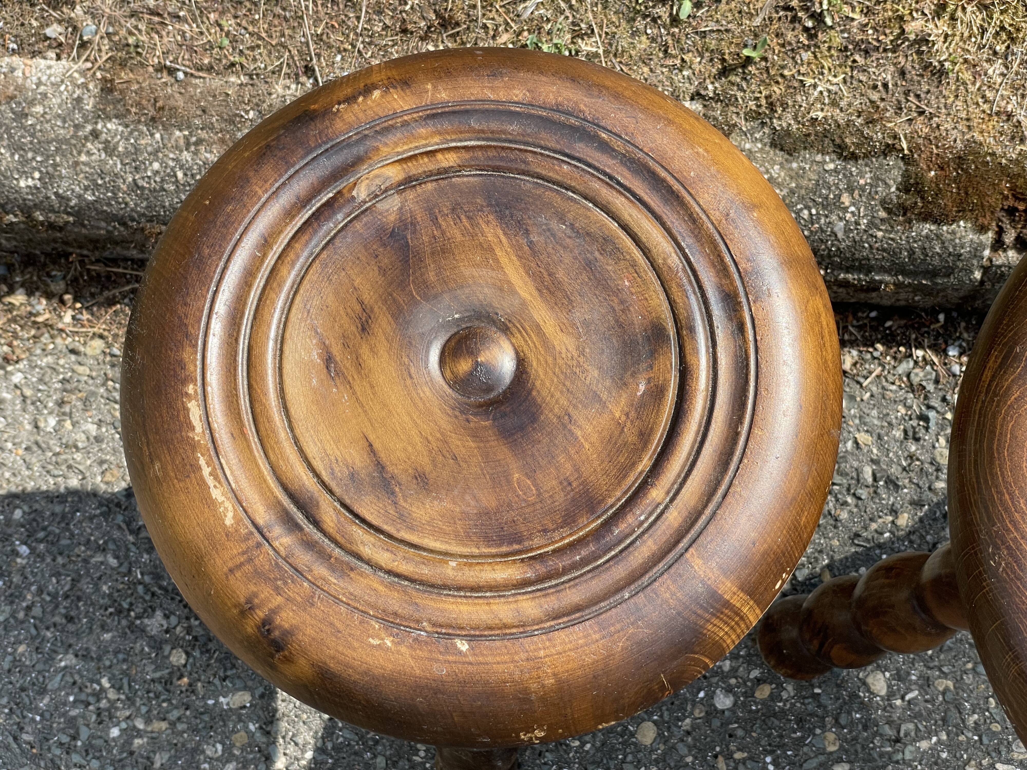 Duo of tripod oak stools