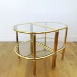 Pairs of gilded metal bedside tables and glass tops