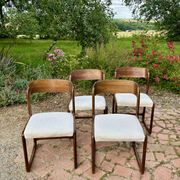 Four vintage Baumann sled chairs from the 1960s 1970s.