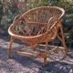 Fauteuil rotin coquille années 60