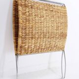 Chrome metal magazine rack with woven banana leaves