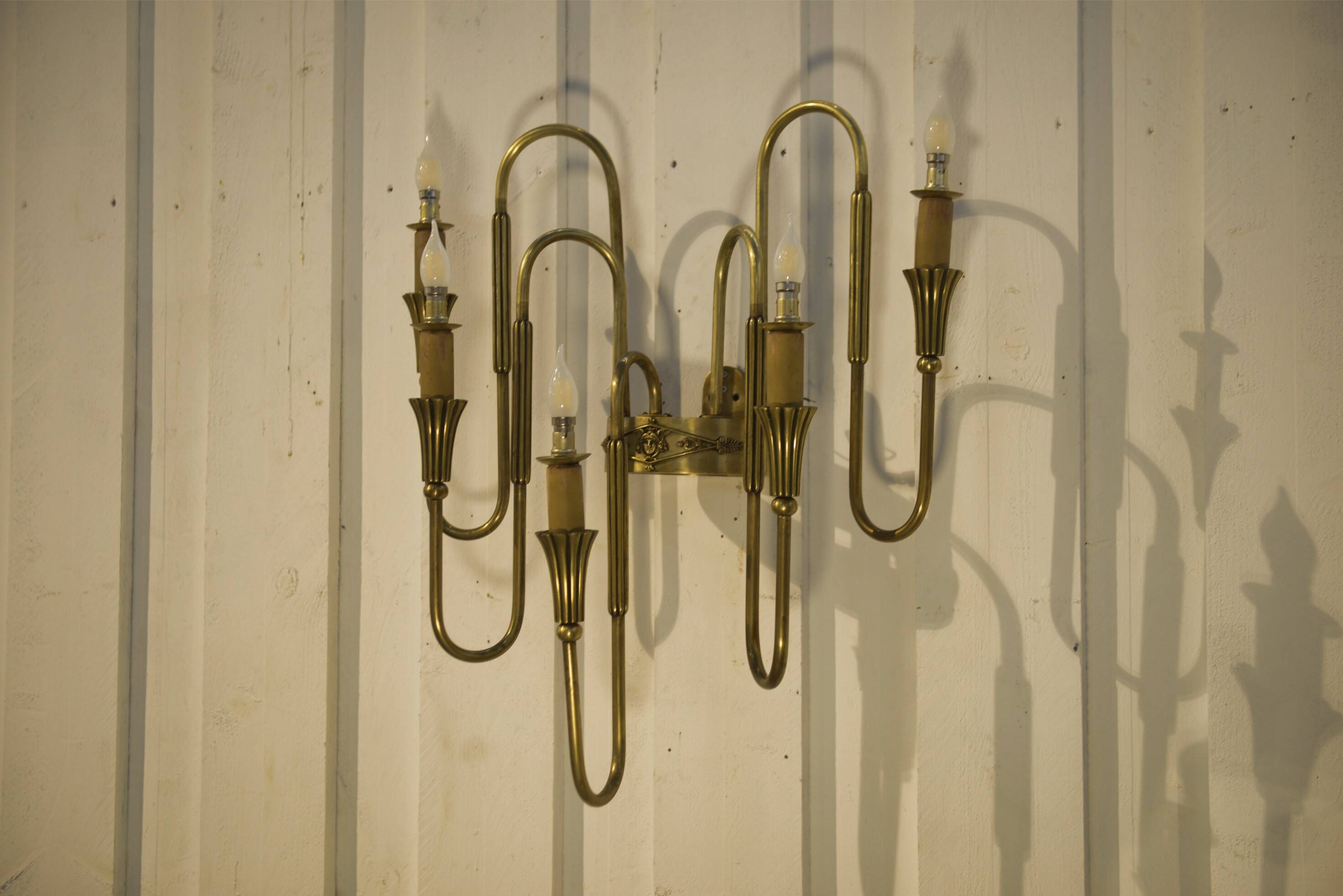 Monumental bronze wall light with 5 arms, neoclassical Art Deco from the 1940s.