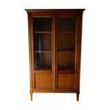 Armoire en bois naturel ouvrant  à deux portes vitrées