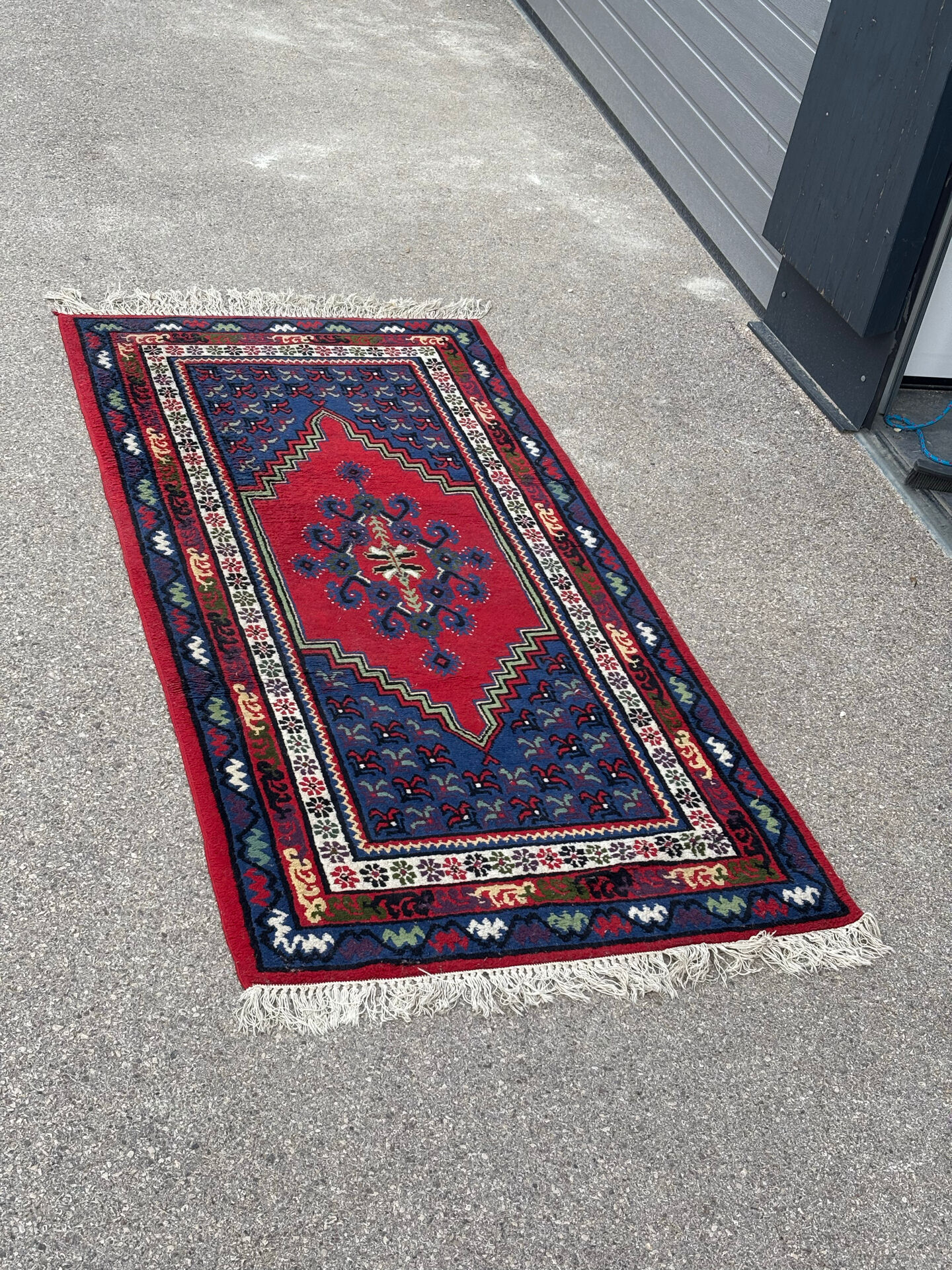 Handwoven wool oriental rug – 220 × 100 cm