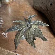 Brass flower candle holder