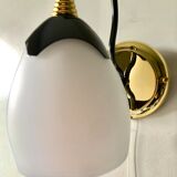 Black and gold wall light with white opaline flower, Italy 1990.