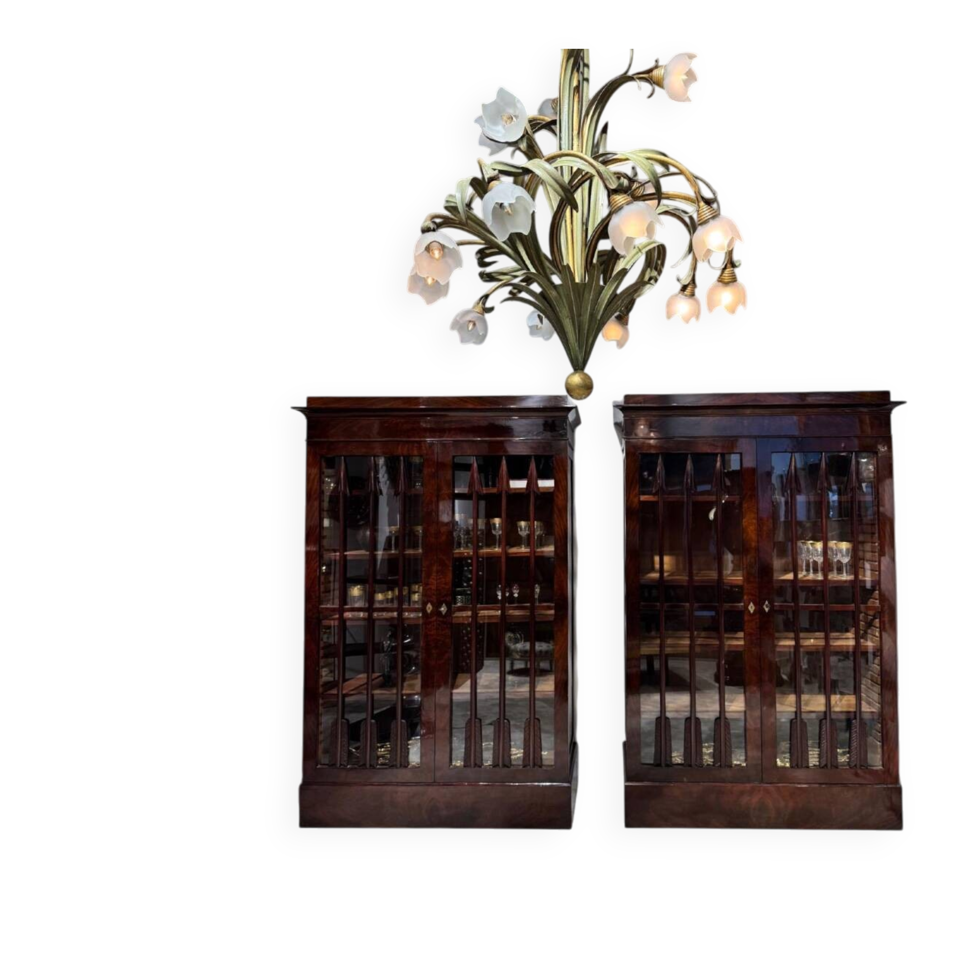 Pair of Empire period mahogany bookcases with flame pattern from the 19th century.