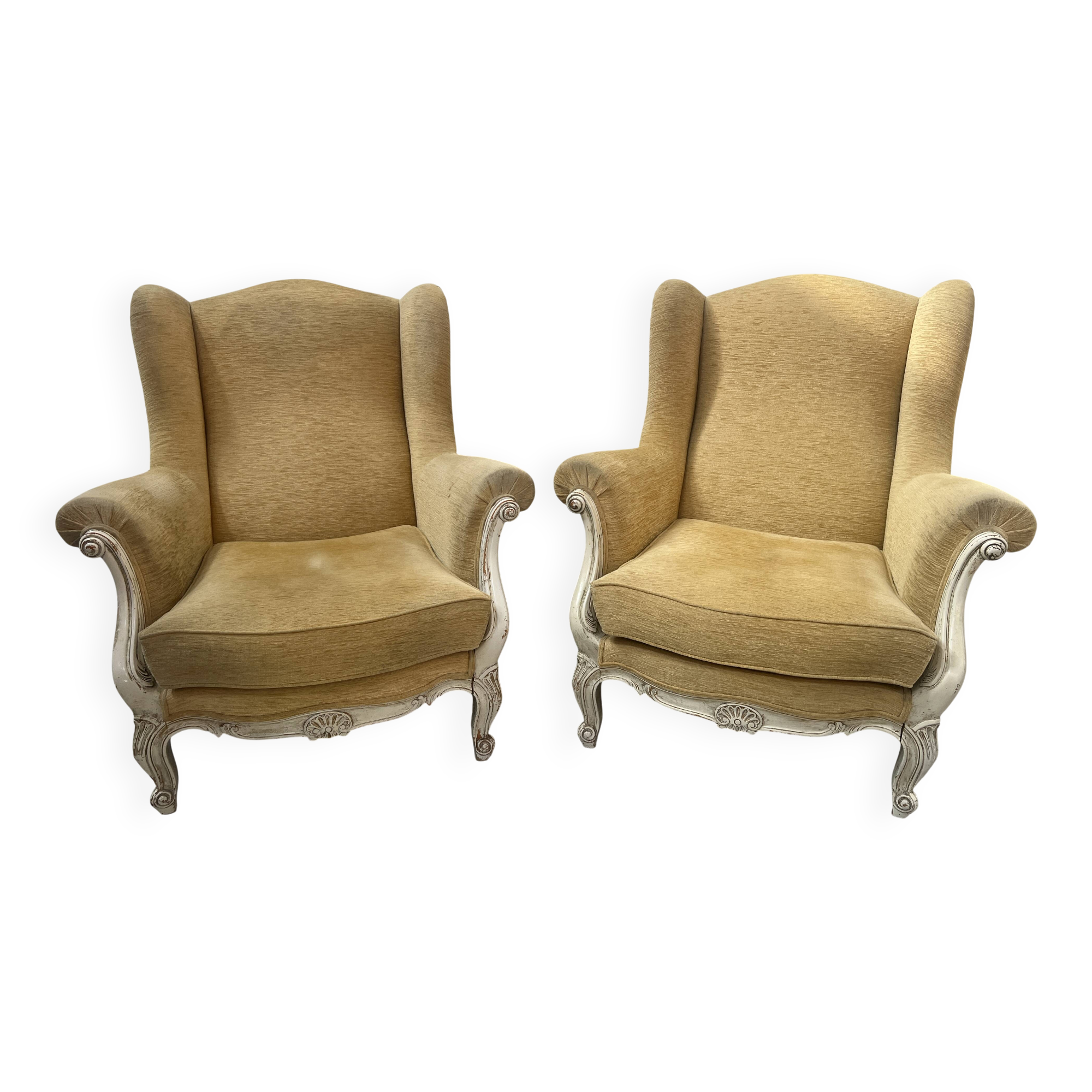 Pair of Louis XV style wing chairs in patinated beech, 20th century