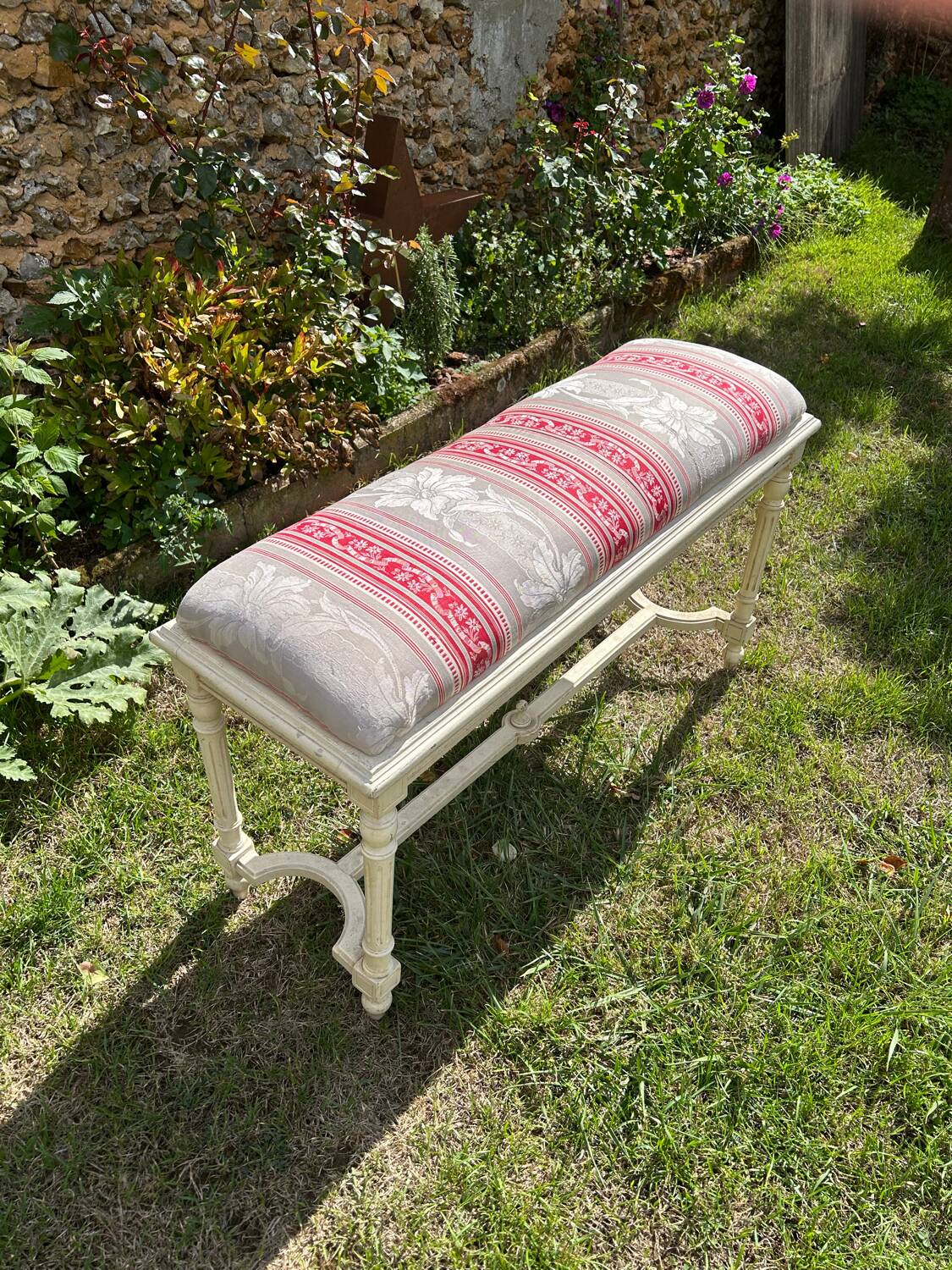 Louis XVI style bench at the end of the bed