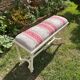 Louis XVI style bench at the end of the bed