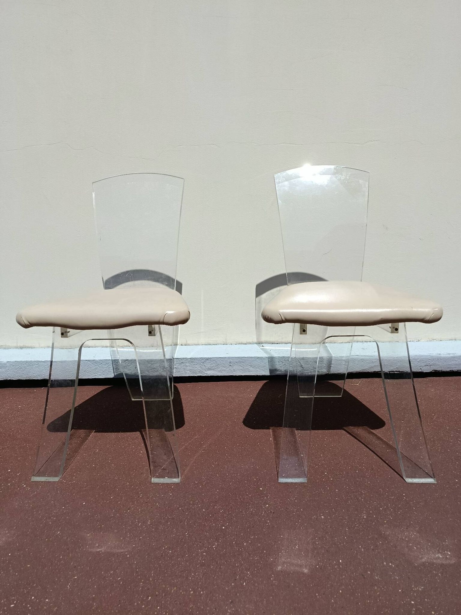70s plexiglass chairs