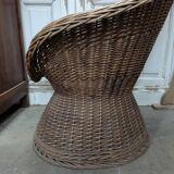 Large woven rattan armchair