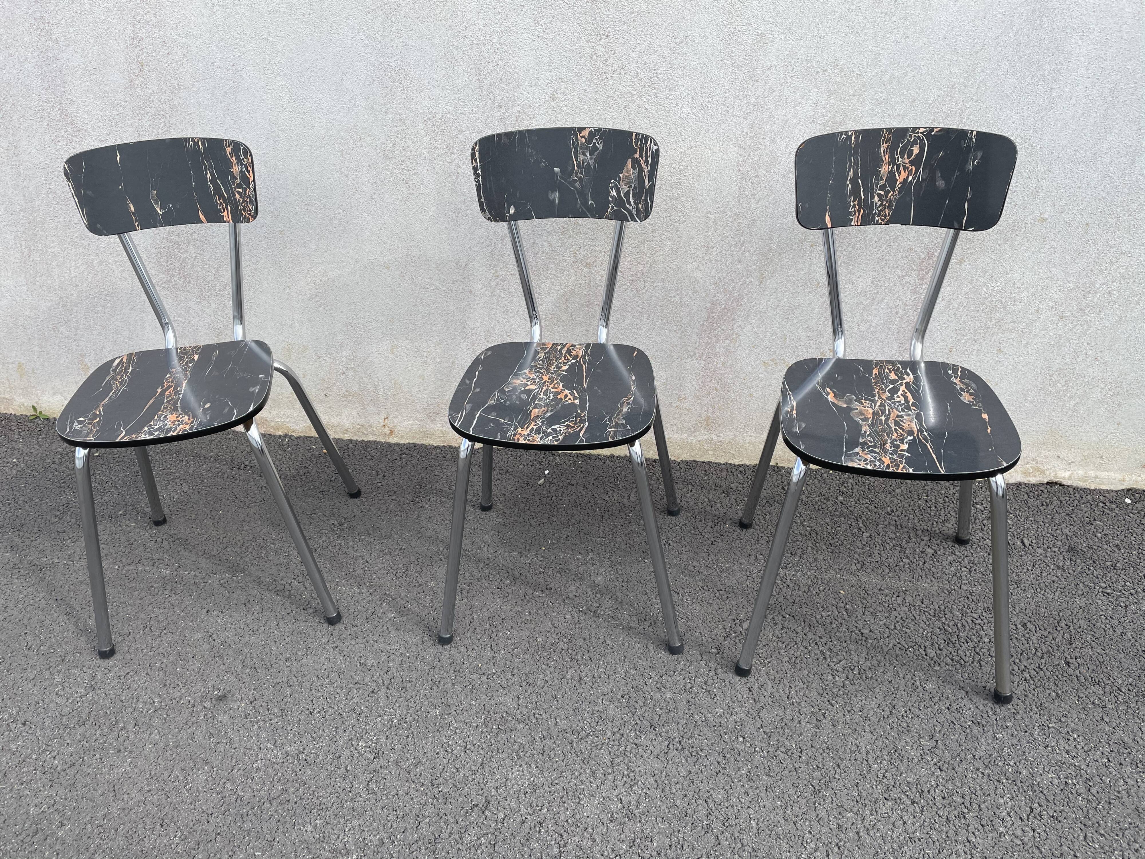 Black marbled formica chairs
