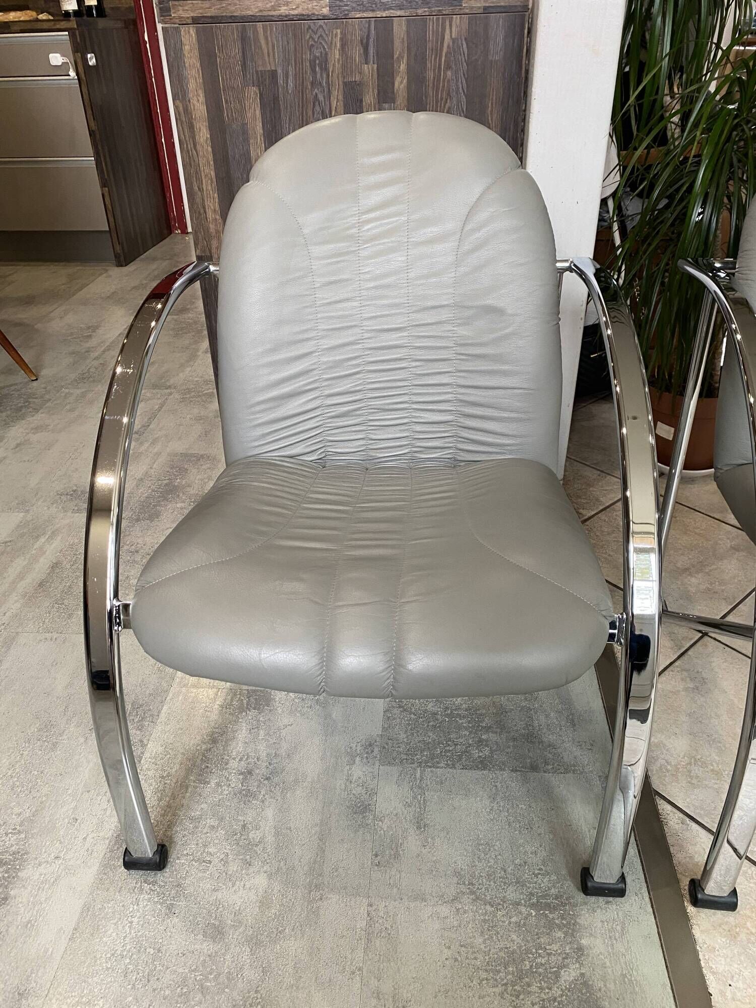 Pair of Souvignet armchairs, grey leather, chrome, 1980.