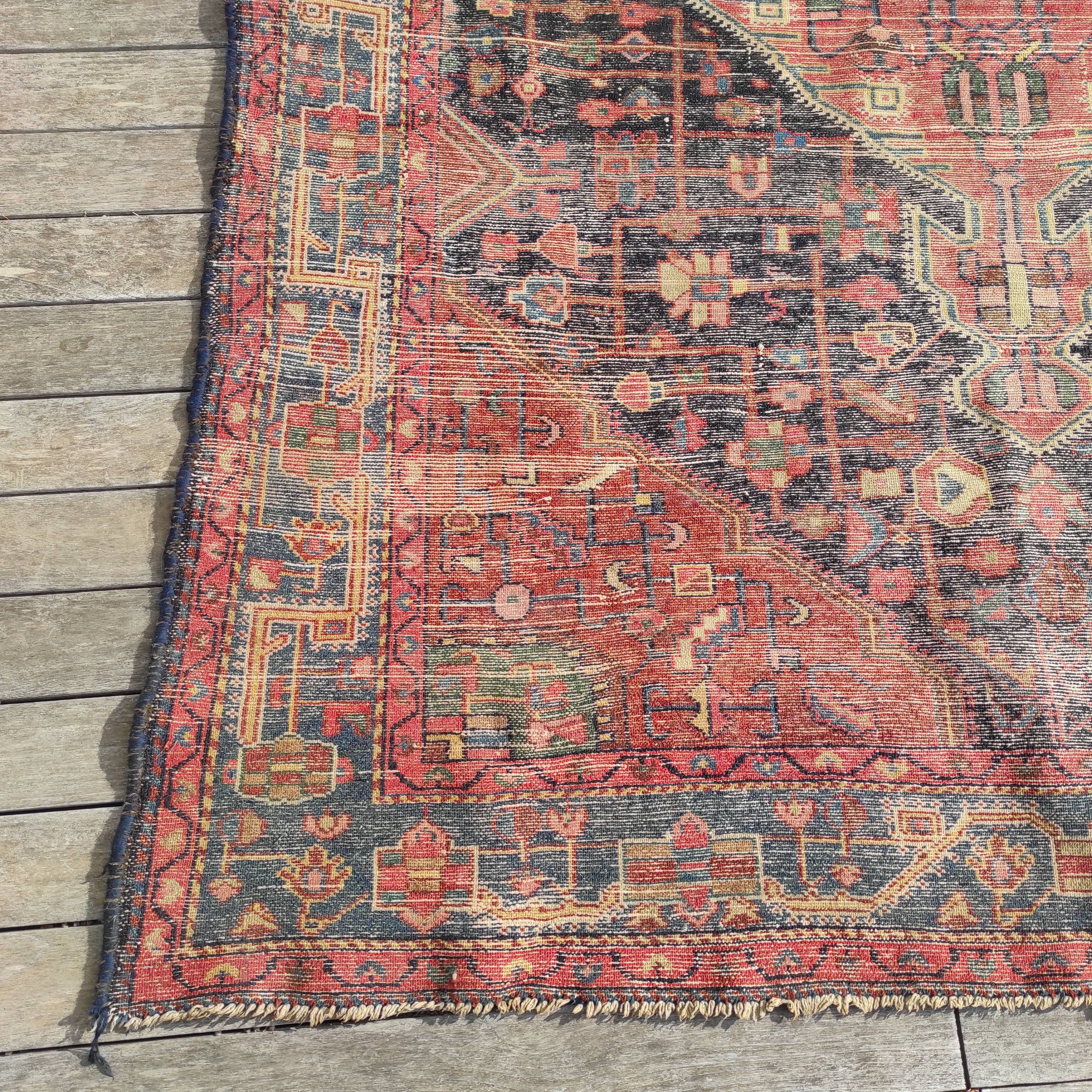 Old Persian carpet 1.62 m wide and 2.33 meters long