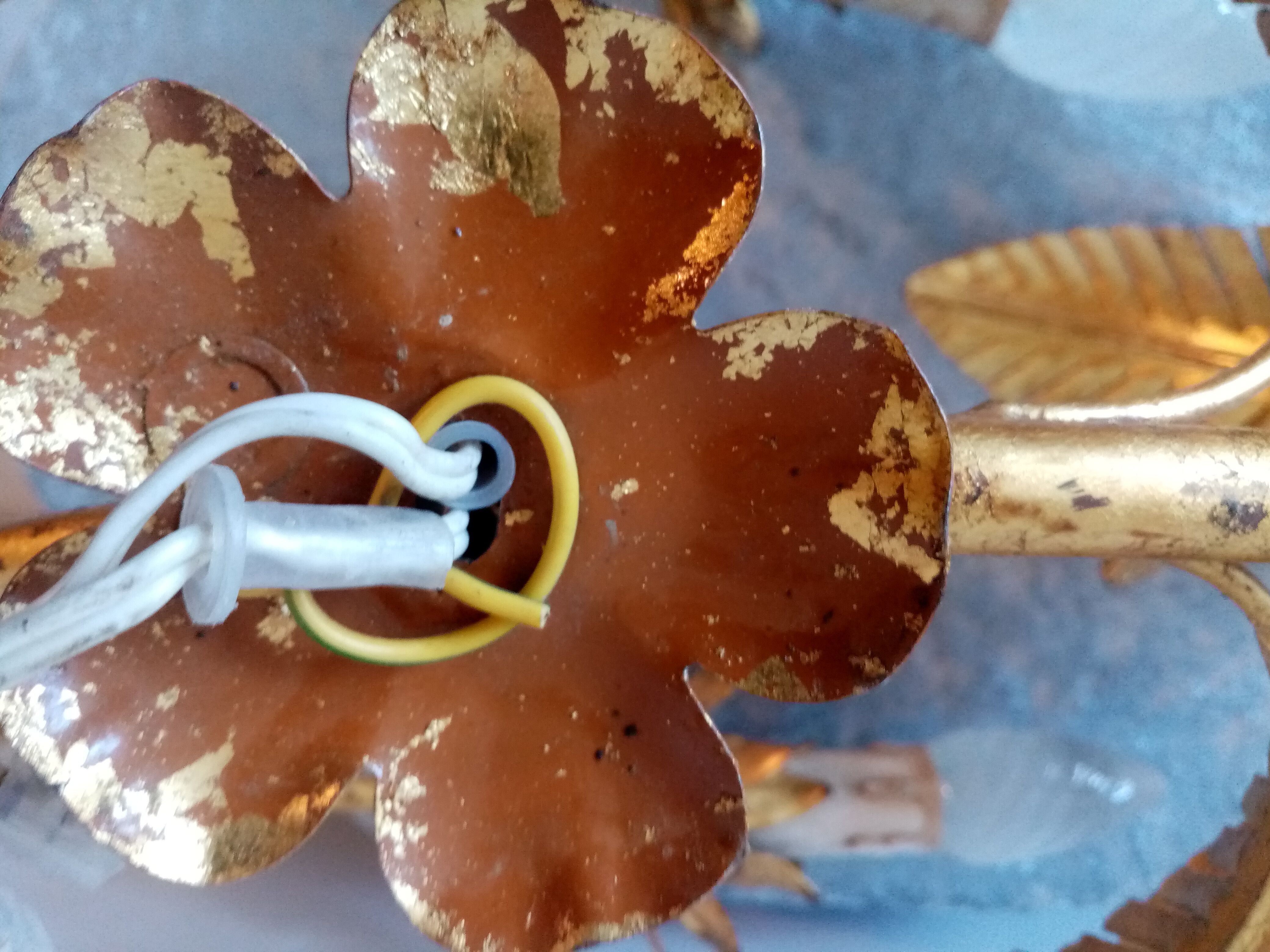 Old wall lamp palm shaped metal dore with leaf