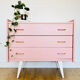 1950s pink and gold chest of drawers