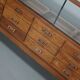 Antique British oak haberdashery cabinet, 1930s